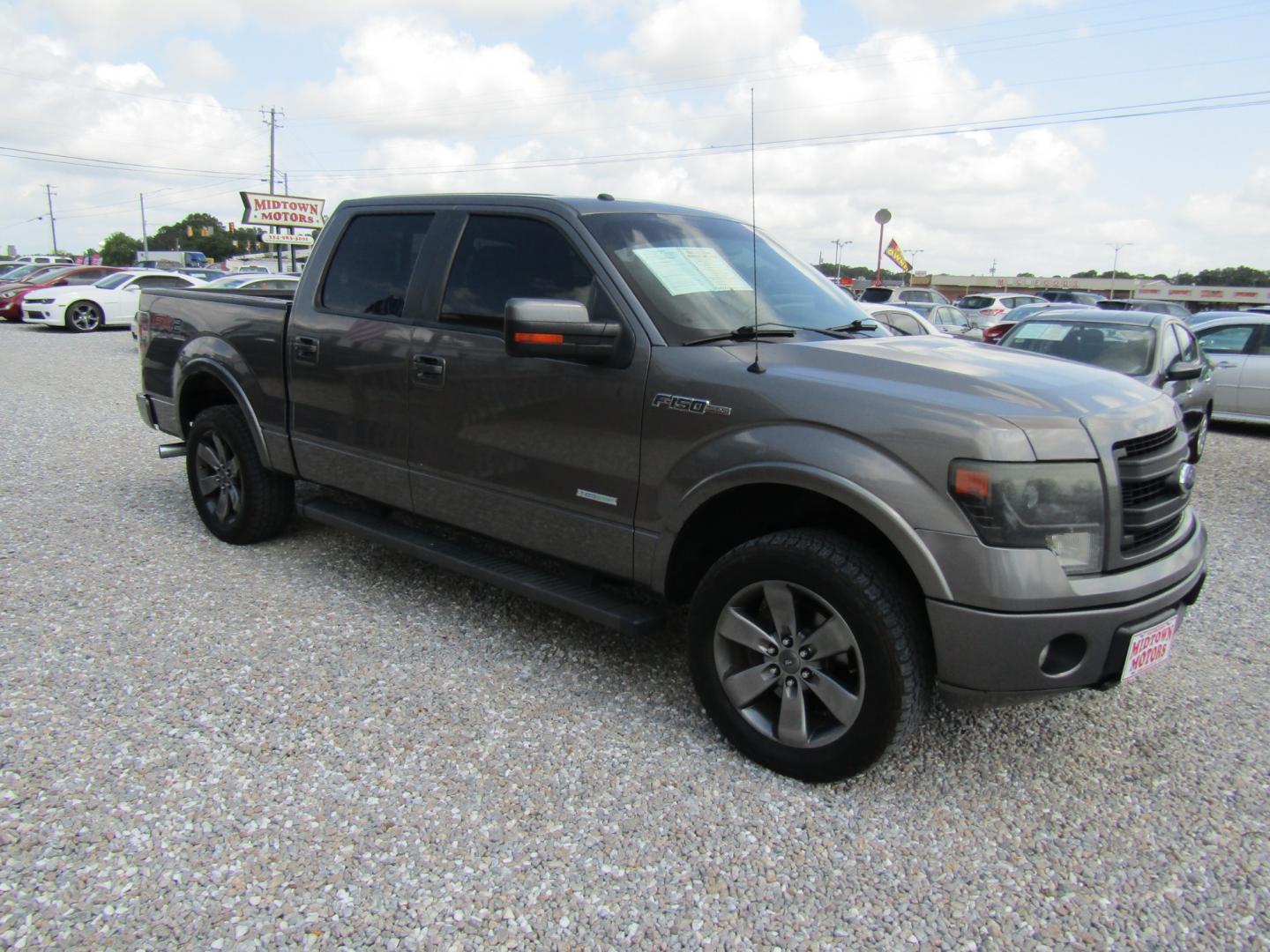 2013 Gray /Gray Ford F-150 Platinum SuperCrew 6.5-ft. Bed 2WD (1FTFW1CTXDF) with an 3.5L V6 TURBO engine, Automatic transmission, located at 15016 S Hwy 231, Midland City, AL, 36350, (334) 983-3001, 31.306210, -85.495277 - Photo#0